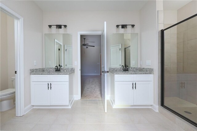 204 Lee Rd Unit 2037, Salem, AL 36874 - bathroom featuring a shower stall, tile patterned floors, a ceiling fan, toilet, and baseboards