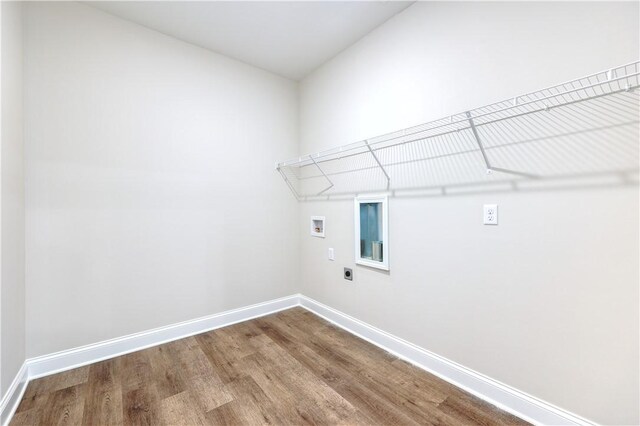 204 Lee Rd Unit 2037, Salem, AL 36874 - laundry area with hookup for an electric dryer, baseboards, wood finished floors, and washer hookup