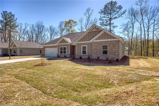 204 Lee Rd Unit 2037, Salem, AL 36874 - craftsman house featuring concrete driveway, an attached garage, brick siding, and a front lawn