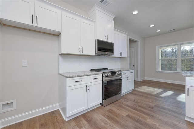 204 Lee Rd Unit 2037, Salem, AL 36874 - kitchen with stainless steel appliances, baseboards, decorative backsplash, light stone counters, and recessed lighting