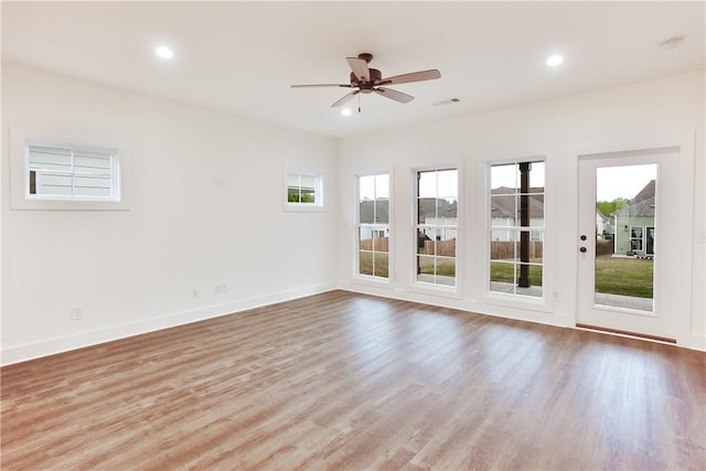 109 Hunters Way, Opelika, AL 36801 - unfurnished room with a ceiling fan, wood finished floors, recessed lighting, and a smoke detector
