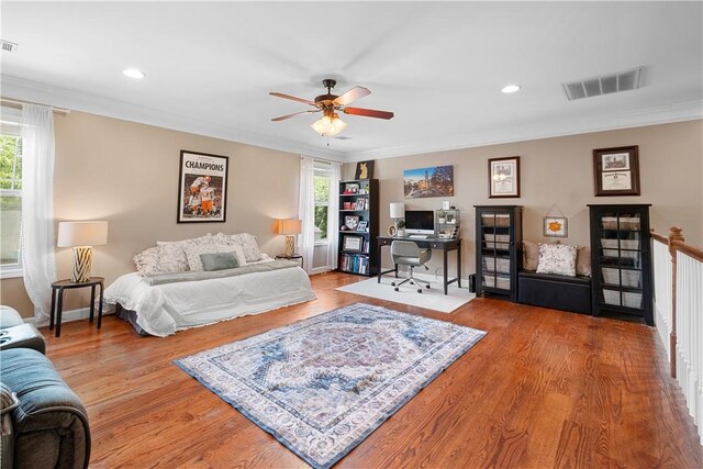 304 Marthas Ct, Opelika, AL 36801 - bedroom with multiple windows, wood finished floors, ornamental molding, an office area, and baseboards