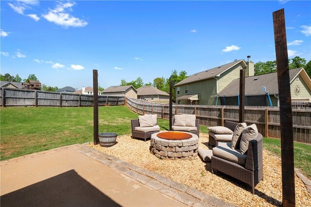 304 Marthas Ct, Opelika, AL 36801 - view of patio with an outdoor fire pit and a residential view