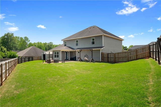 304 Marthas Ct, Opelika, AL 36801 - back of property featuring a patio area and a garage
