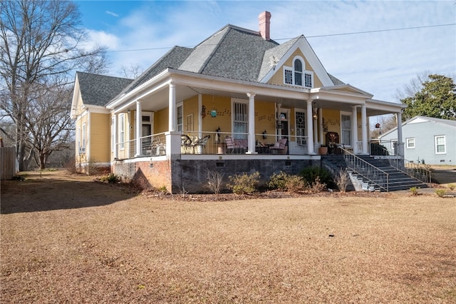 117 N Lafayette St, Lafayette, AL 36862 - farmhouse-style home with a porch, roof with shingles, and a chimney