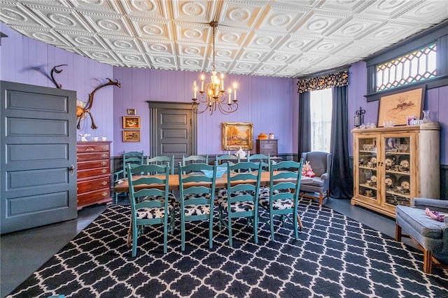 dining room featuring an ornate ceiling and a notable chandelier