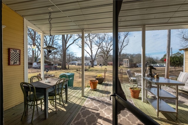 sunroom featuring a healthy amount of sunlight