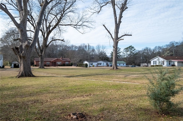 view of yard featuring a residential view