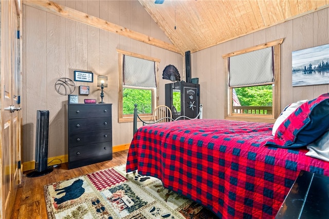 1515 County Road 63, Tuskegee, AL 36083 - bedroom featuring wood finished floors, wood walls, lofted ceiling, and wood ceiling