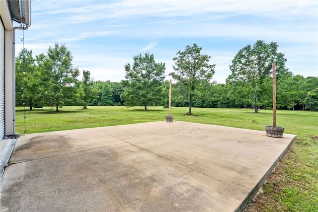 1515 County Road 63, Tuskegee, AL 36083 - view of patio featuring view of scattered trees