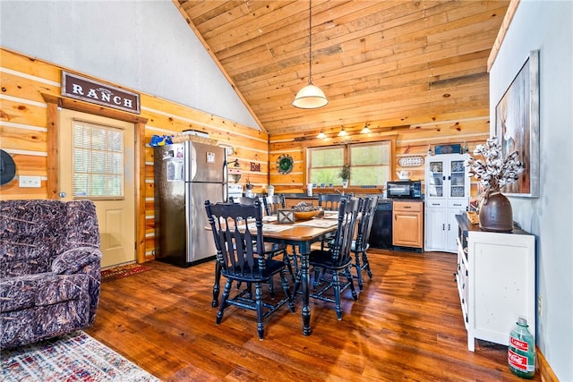 1515 County Road 63, Tuskegee, AL 36083 - dining area featuring wooden ceiling, dark wood-type flooring, and high vaulted ceiling