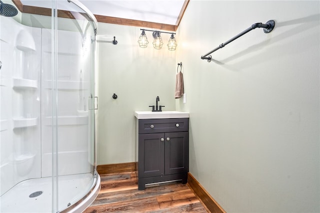 1515 County Road 63, Tuskegee, AL 36083 - full bath featuring wood finished floors, a shower stall, and vanity