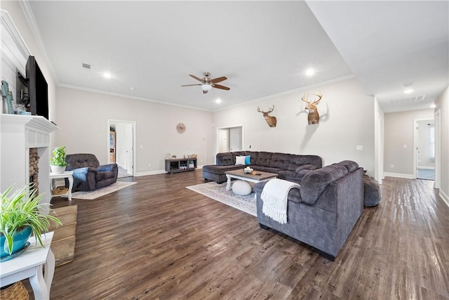 living area with a ceiling fan, dark wood finished floors, recessed lighting, a fireplace, and baseboards