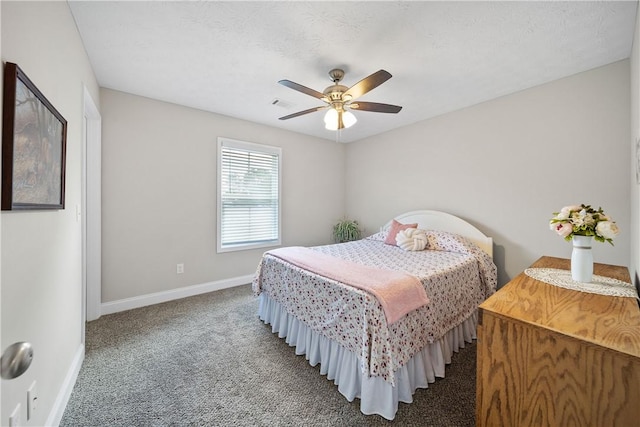 bedroom with baseboards, carpet flooring, and a ceiling fan