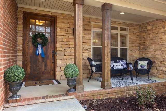 entrance to property with covered porch