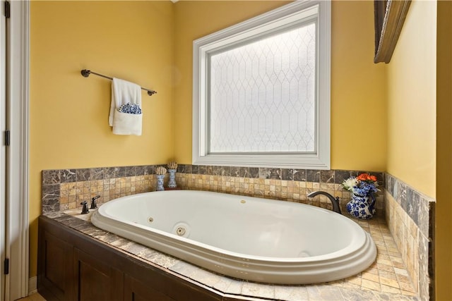 bathroom featuring tiled bath