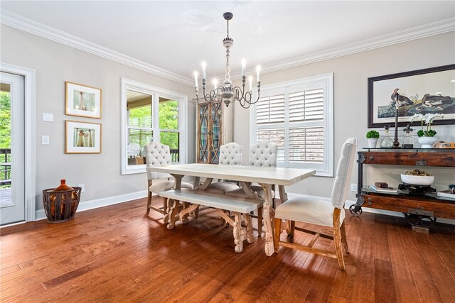 1462 Turn Lake Dr, Auburn, AL 36830 - dining space featuring a chandelier, crown molding, plenty of natural light, and hardwood / wood-style flooring