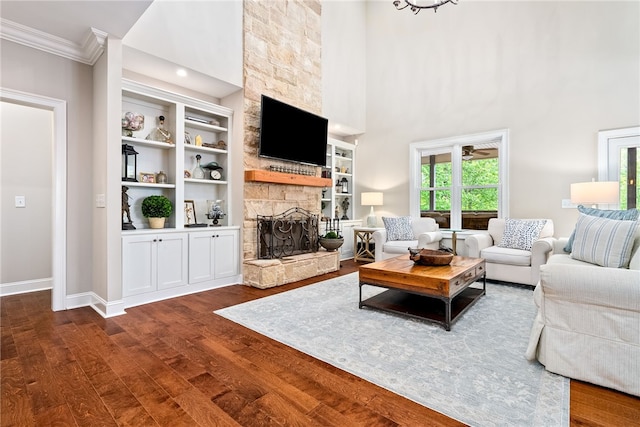 1462 Turn Lake Dr, Auburn, AL 36830 - living room with ornamental molding, a stone fireplace, dark wood-style flooring, and a high ceiling