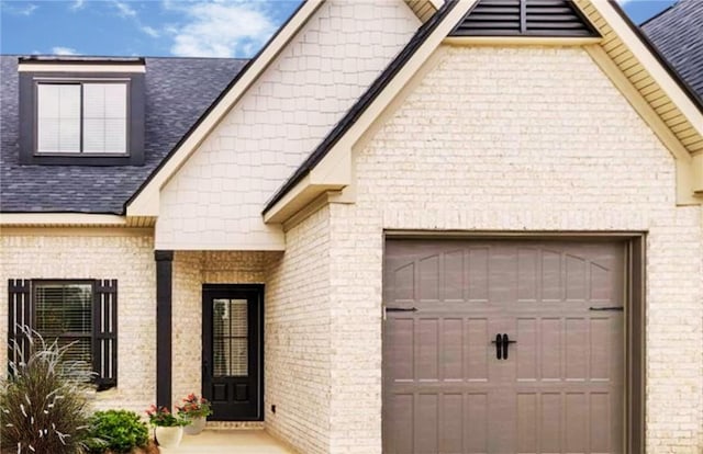 entrance to property with a garage