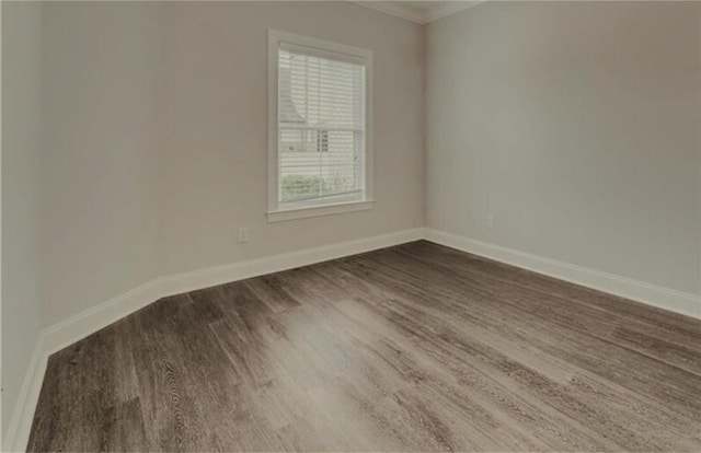 empty room featuring hardwood / wood-style flooring