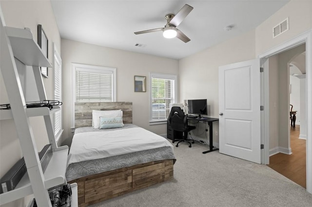 484 Bennington Ct, Auburn, AL 36830 - bedroom with carpet, an office area, arched walkways, a ceiling fan, and baseboards