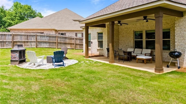484 Bennington Ct, Auburn, AL 36830 - view of yard featuring a patio, a ceiling fan, and an outdoor living space with a fire pit
