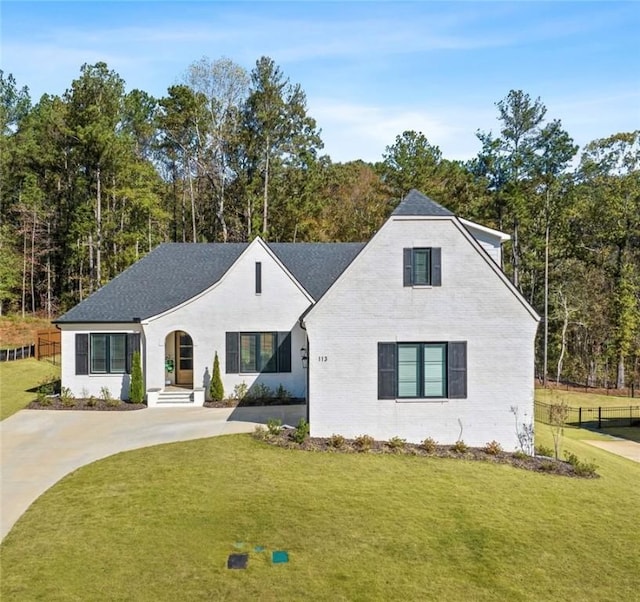 view of front of home with a front yard