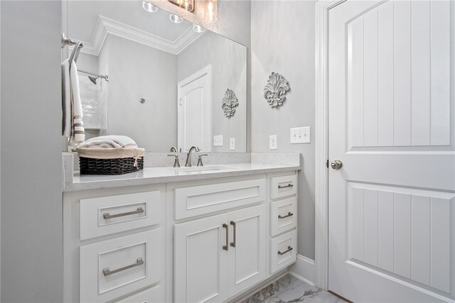 bathroom featuring vanity and ornamental molding