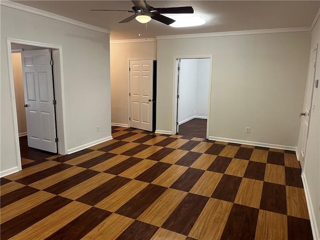 unfurnished bedroom featuring ceiling fan and crown molding