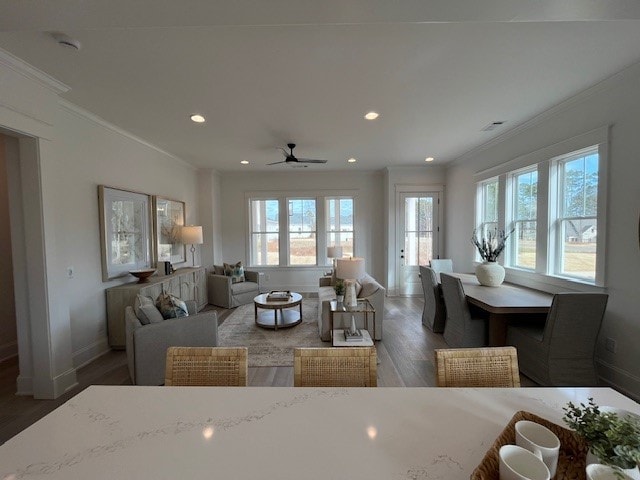 interior space featuring ornamental molding and dark hardwood / wood-style floors