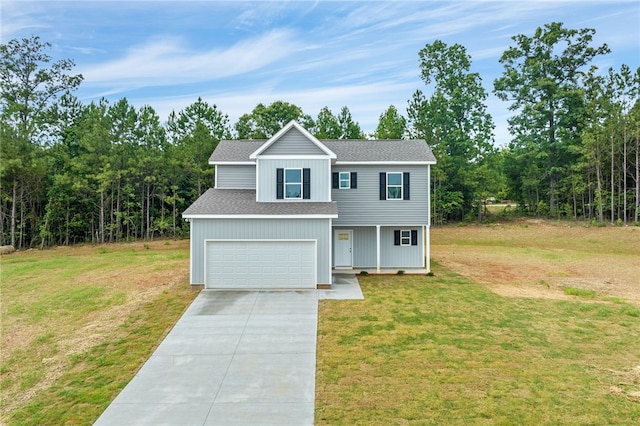 view of front of property with a front lawn and a garage