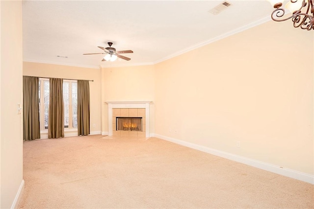 1630 Academy Dr Unit 404, Auburn, AL 36830 - unfurnished living room with carpet flooring, ceiling fan, crown molding, and a tiled fireplace