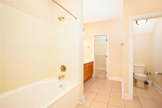 1630 Academy Dr Unit 404, Auburn, AL 36830 - full bathroom with tile patterned flooring, shower / tub combination, vanity, and a walk in closet