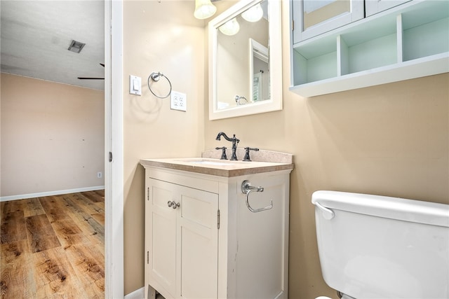 630 Apache St, Auburn, AL 36830 - half bathroom with wood finished floors and vanity