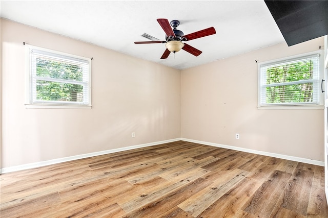 630 Apache St, Auburn, AL 36830 - empty room featuring wood finished floors and a ceiling fan