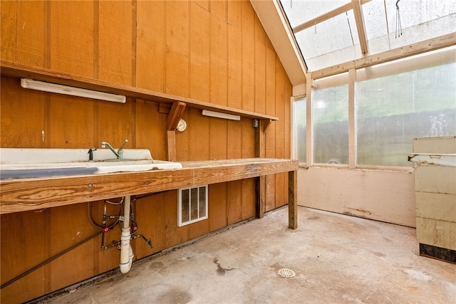 630 Apache St, Auburn, AL 36830 - misc room featuring concrete floors and wood walls