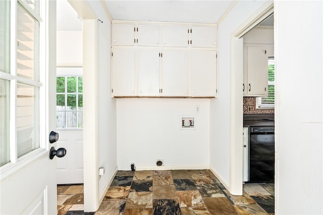 630 Apache St, Auburn, AL 36830 - laundry room featuring cabinet space, dark stone finish floors, washer hookup, and hookup for an electric dryer