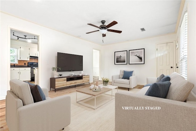 630 Apache St, Auburn, AL 36830 - living area featuring a ceiling fan and light wood-type flooring