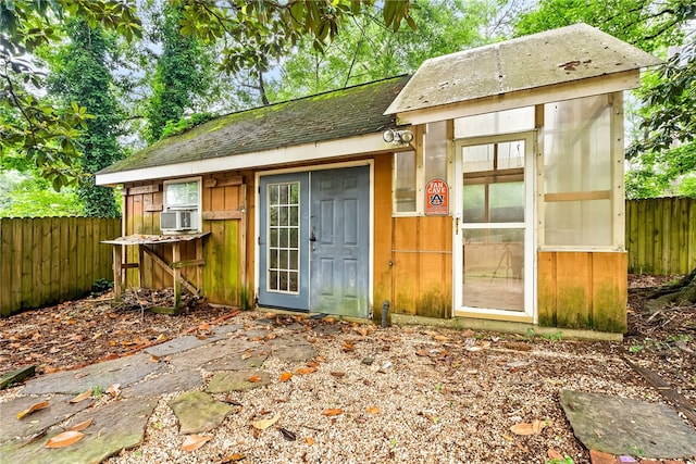 630 Apache St, Auburn, AL 36830 - view of outbuilding with a fenced backyard and cooling unit