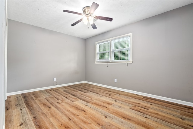 630 Apache St, Auburn, AL 36830 - unfurnished room with wood finished floors and a ceiling fan