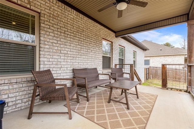 view of patio / terrace featuring ceiling fan and outdoor lounge area