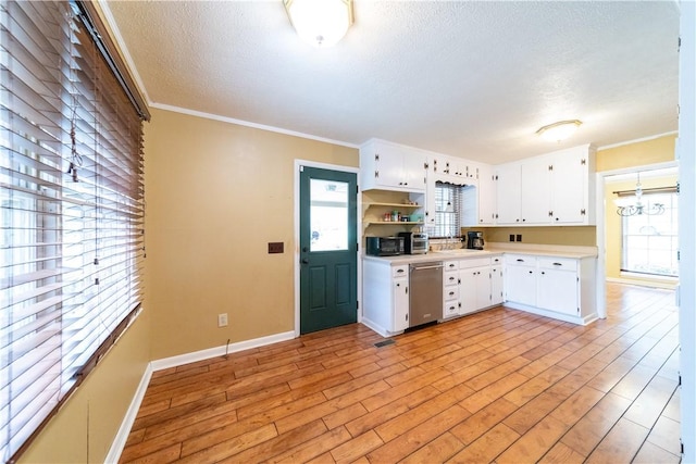 kitchen featuring light countertops, ornamental molding, light wood-type flooring, dishwasher, and open shelves