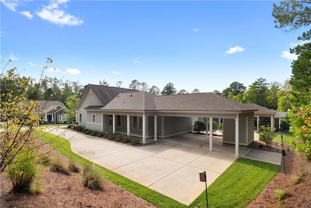 back of property featuring a carport