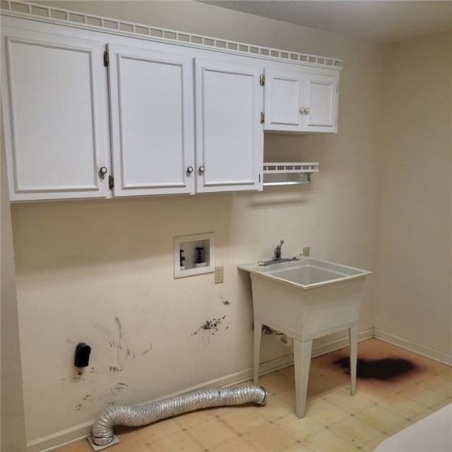 2521 28th Ave, Lanett, AL 36863 - washroom with cabinet space, washer hookup, and light flooring
