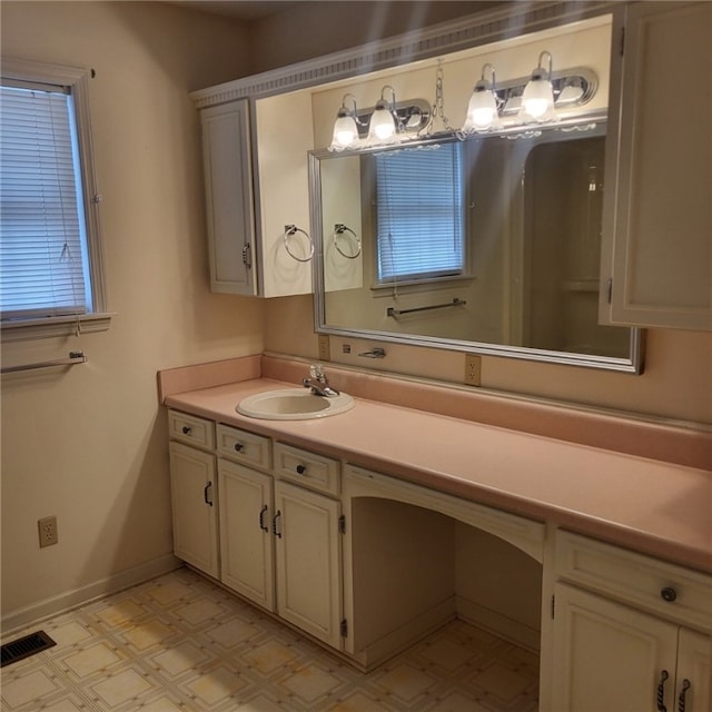2521 28th Ave, Lanett, AL 36863 - bathroom featuring tile patterned floors and vanity
