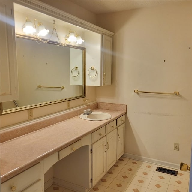 2521 28th Ave, Lanett, AL 36863 - bathroom with vanity and tile patterned floors