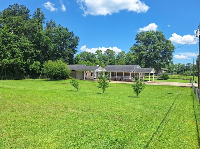 2521 28th Ave, Lanett, AL 36863 - view of yard featuring a detached carport and driveway