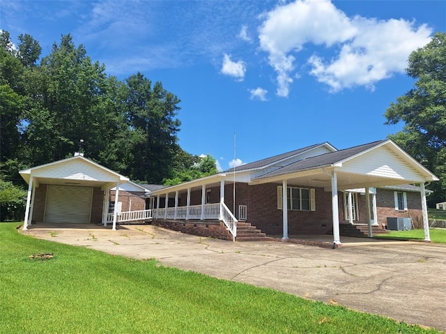 2521 28th Ave, Lanett, AL 36863 - single story home featuring concrete driveway, a front lawn, brick siding, and a porch
