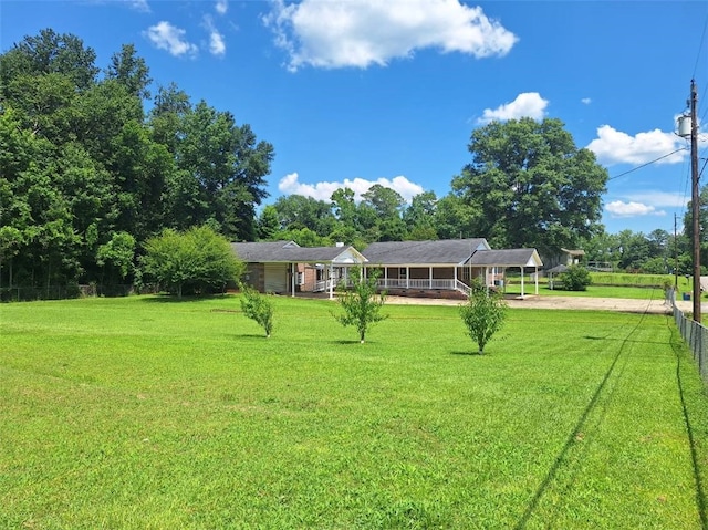 2521 28th Ave, Lanett, AL 36863 - view of yard with driveway and a carport
