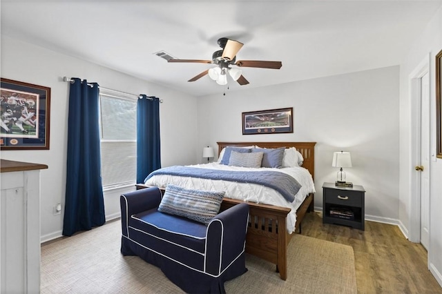 528 Genelda Ave Unit 19, Auburn, AL 36832 - bedroom with wood finished floors and ceiling fan